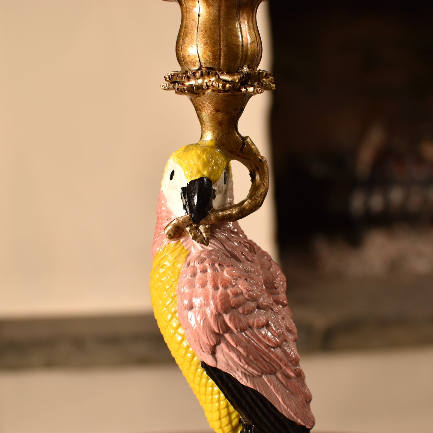 Decorative parrot figure on a candlestick